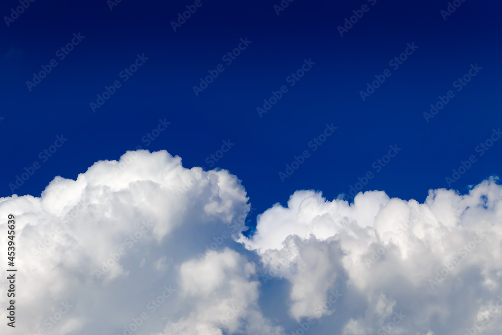 white cumulus clouds in the blue sky white cumulus clouds in the blue sky