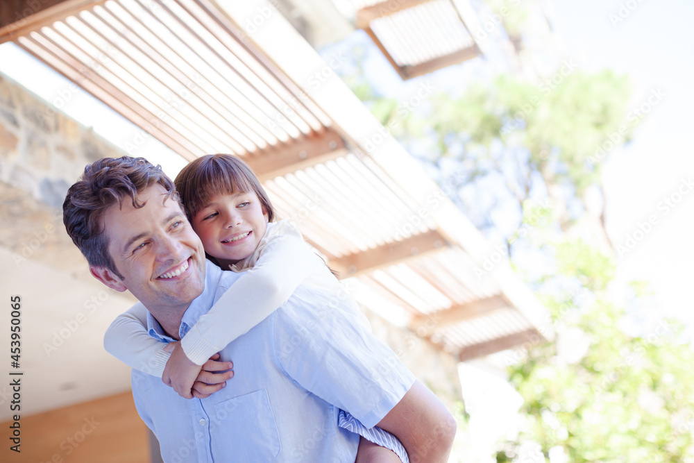 Fototapeta premium Father and daughter hugging outdoors
