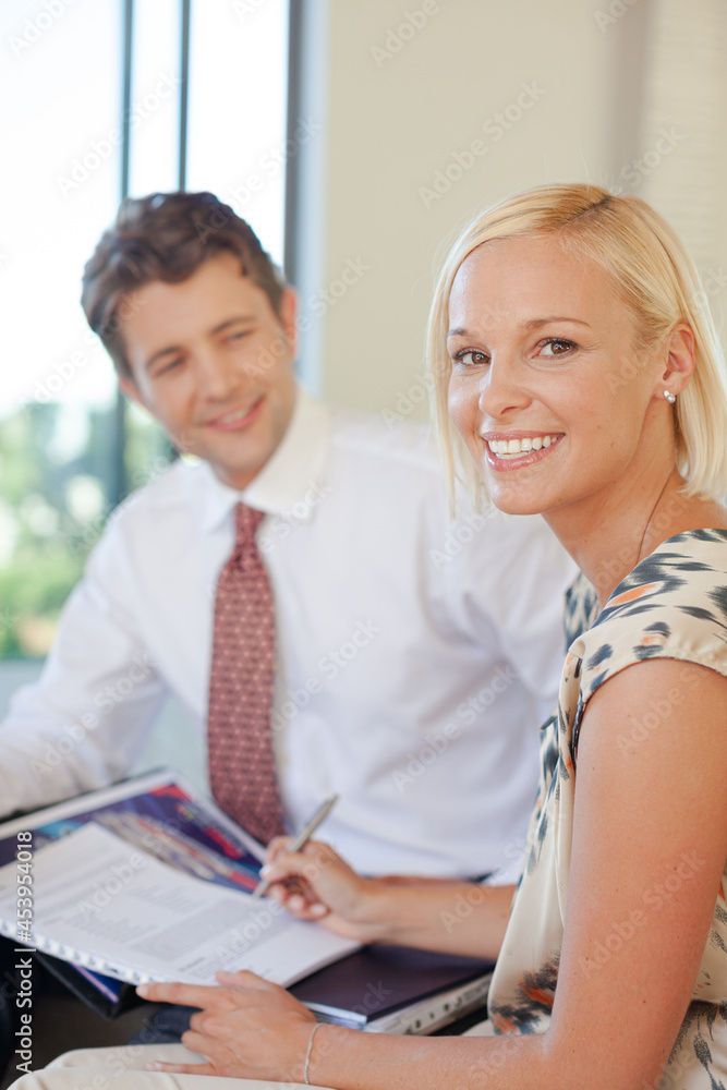 Financial advisor talking to client on sofa Financial advisor talking to client on sofa