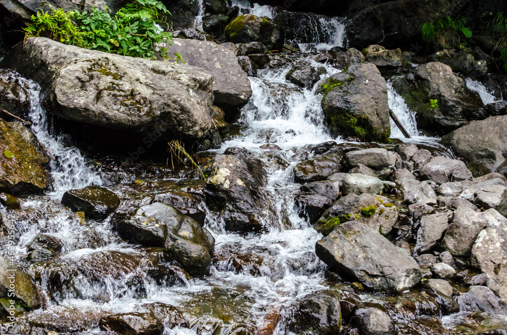 Mountain waterfalls in Abkhazia in summer long exposure Mountain waterfalls in Abkhazia in summer long exposure
