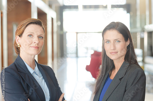 Businesswomen smiling in office