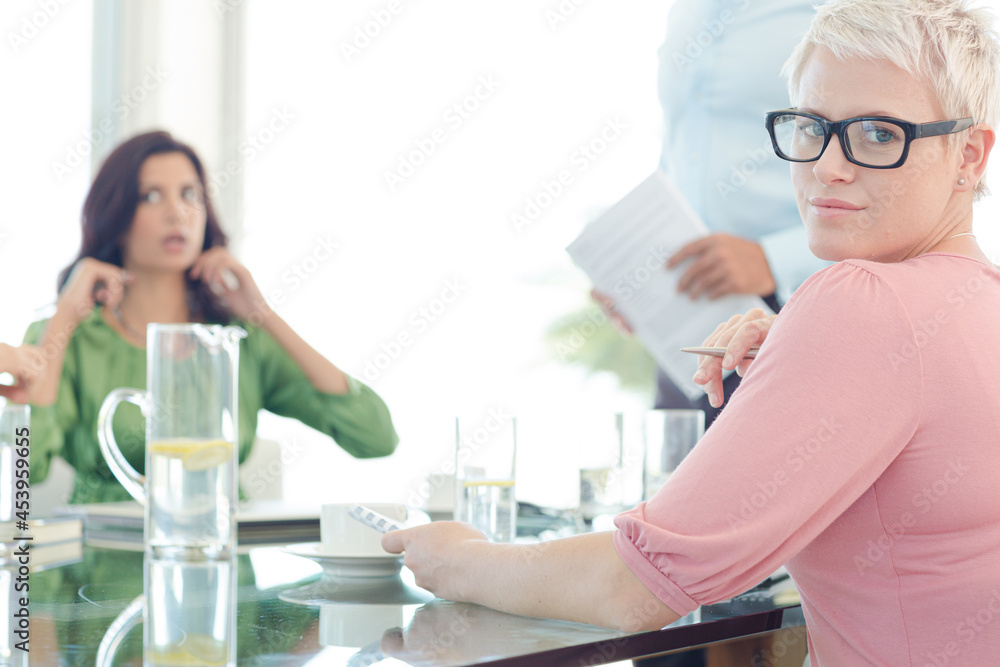 Obraz premium Businesswoman sitting in meeting