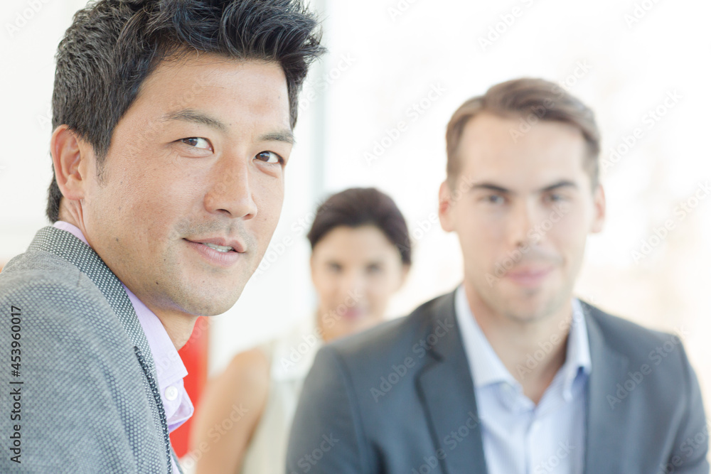 Business people smiling on sofa Business people smiling on sofa