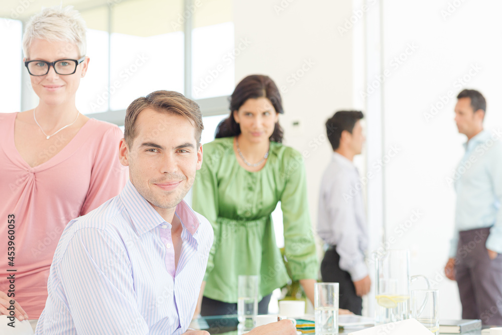 Fototapeta premium Business people smiling together in office