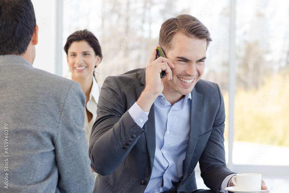 Businessman talking on cell phone