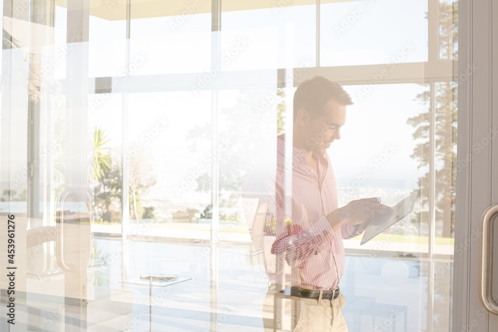 Businessman using tablet computer outdoors Businessman using tablet computer outdoors