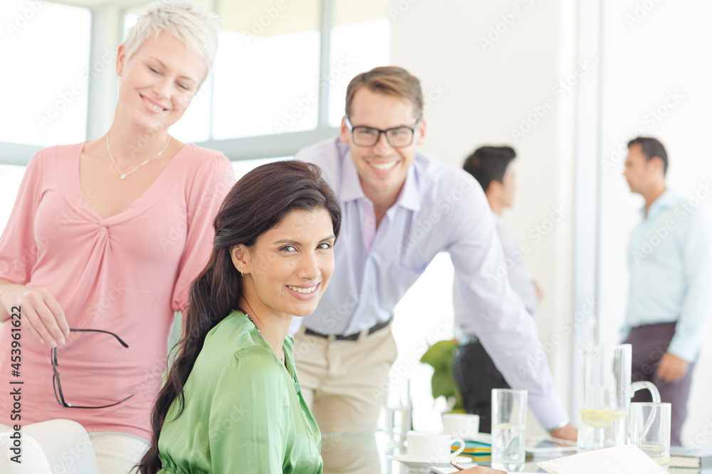 Fototapeta premium Business people smiling together in office
