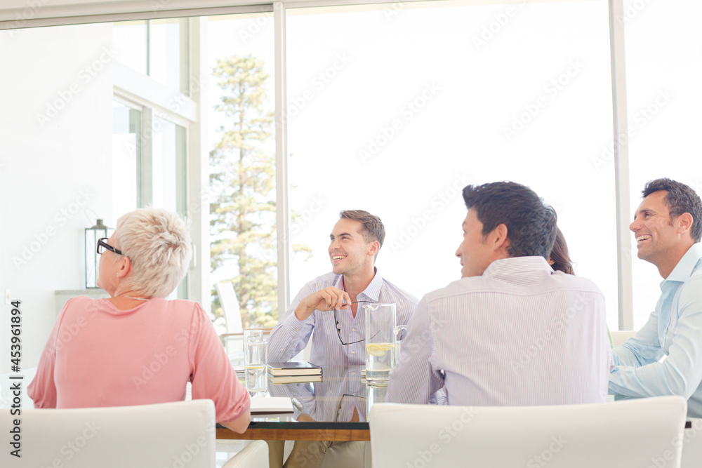 Business people sitting in meeting Business people sitting in meeting