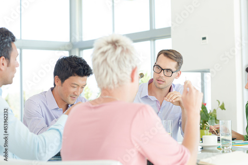 Business people talking in meeting © KOTO