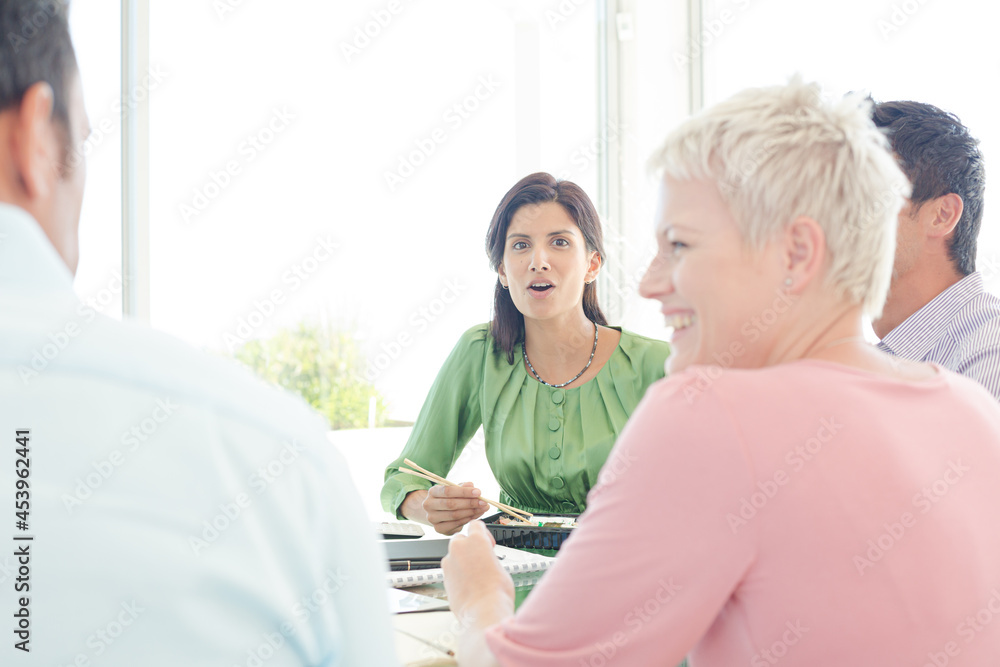 Business people talking in office Business people talking in office