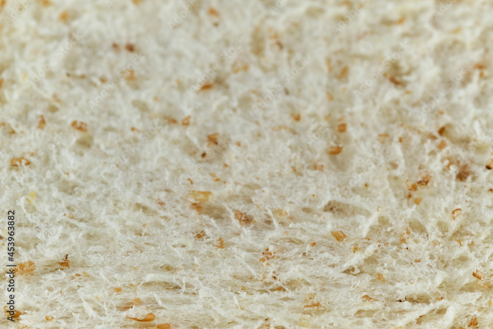 close up shot of a surface texture of sliced whole wheat sandwich bread for food background wallpaper