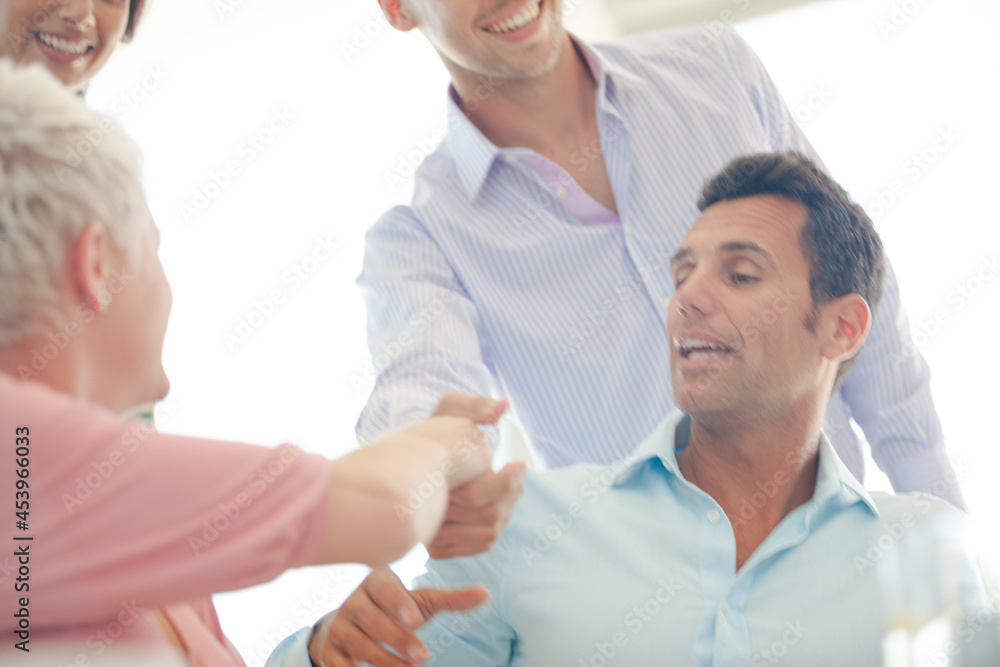 Fototapeta premium Businessmen shaking hands in office