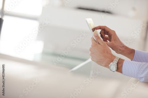 Hands of businessman using tablet computer