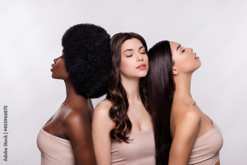 Fototapeta premium Photo of three young attractive girls cosmetology bodycare perfect dreamy enjoy treatment isolated over grey color background