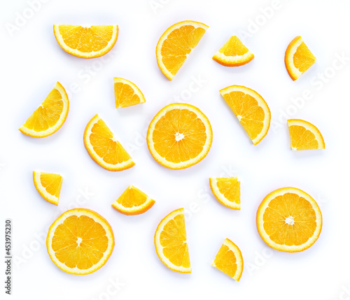 Fruit pattern of fresh orange slices on white background
