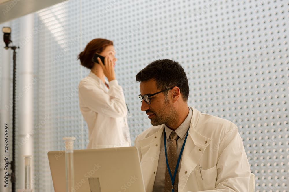 Doctor working at laptop Doctor working at laptop