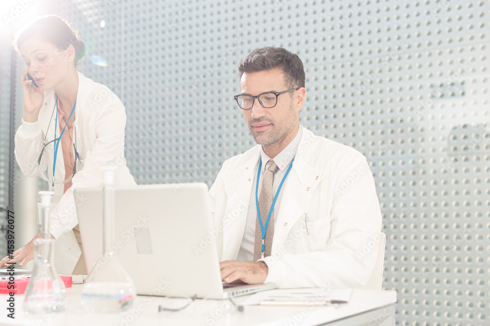 Doctors working at laptop Doctors working at laptop