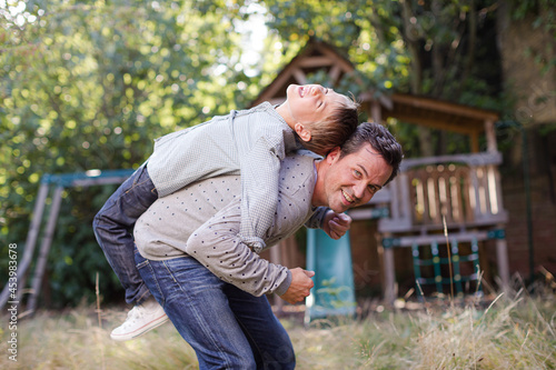 Father and son playing outdoors