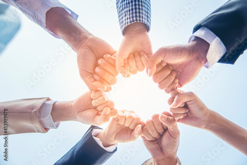 Schilderij op canvas Diverse multiethnic Partners hands together teamwork group of multi racial people meeting join hands togetherness