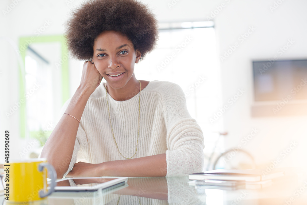 Woman using digital tablet at desk Woman using digital tablet at desk