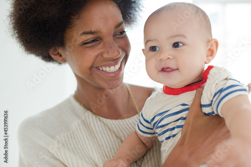 Mother holding baby boy