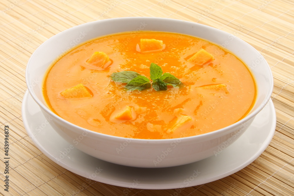 Homemade tasty pumpkin soup - vegan diet meal- traditional recipes background. Homemade tasty pumpkin soup - vegan diet meal- traditional recipes background.