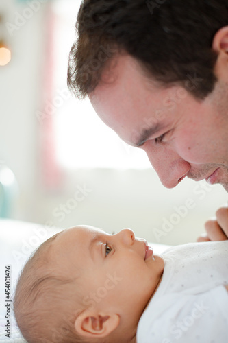 Father adoring baby boy