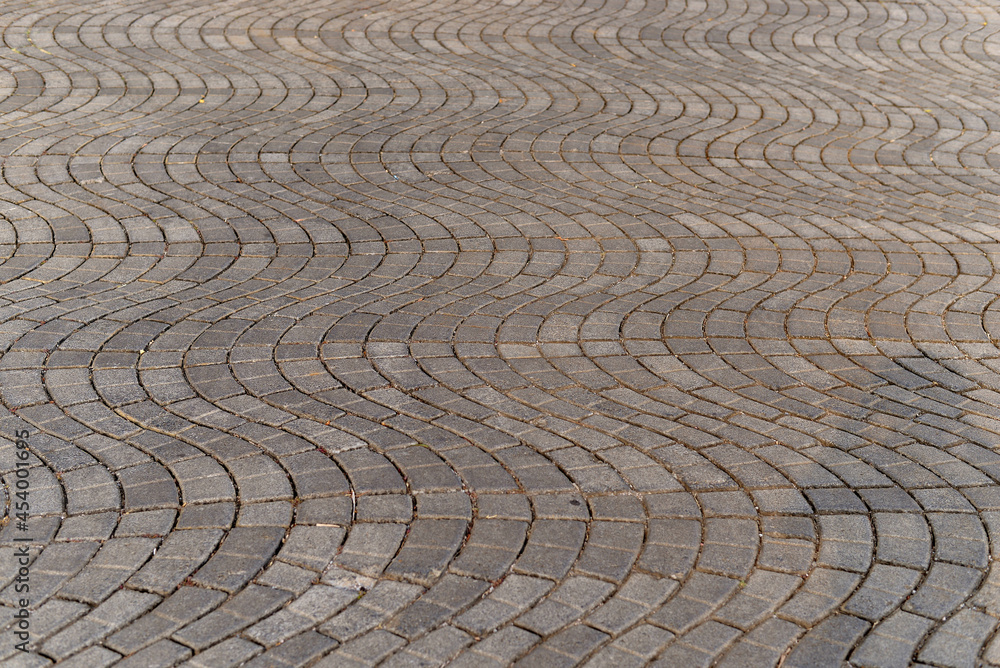 Perspective Viewing Monotone Gray Brick Stone Pavement on Ground for Roads. Sidewalk, Driveway, Pavers, Pavement in Vintage Design Ground Flooring Square Pattern Texture Background to mock up Perspective Viewing Monotone Gray Brick Stone Pavement on Ground for Roads. Sidewalk, Driveway, Pavers, Pavement in Vintage Design Ground Flooring Square Pattern Texture Background to mock up