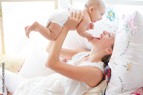 Mother playing with baby boy