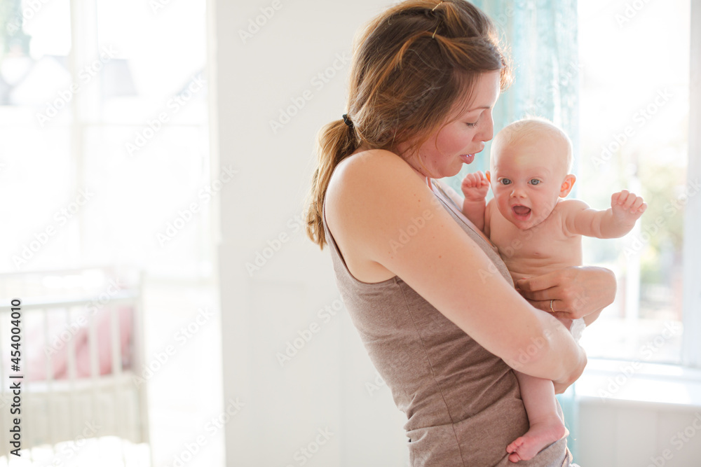 Mother holding baby girl Mother holding baby girl