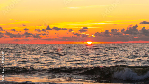 Beautiful sunset on the Baltic Sea  multi-colored colors  romantic mood  golden light reflections on the water 