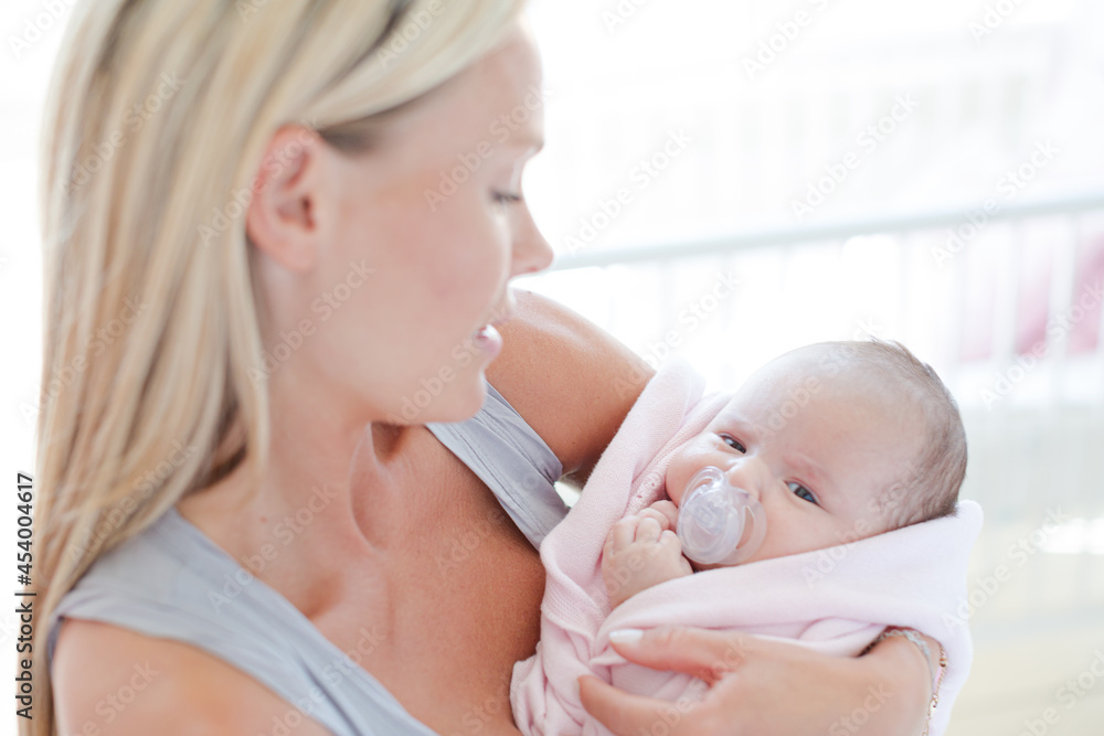 Mother holding baby girl Mother holding baby girl