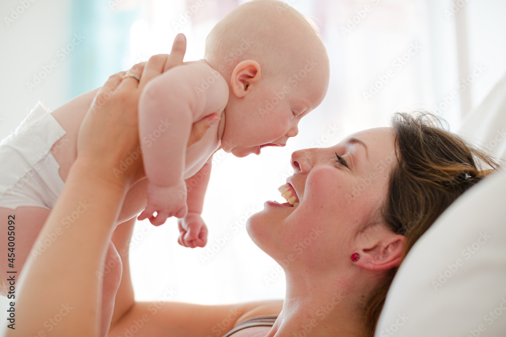 Mother holding baby girl Mother holding baby girl