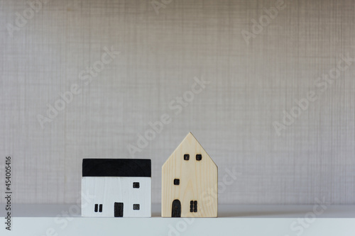 Small wooden toy home on desk,concept,soft focus.