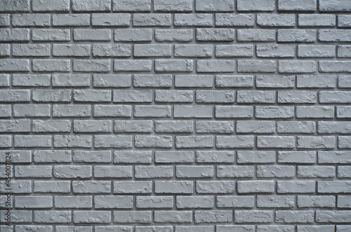 Gray old brick wall texture background. Retro brick wall backdrop.