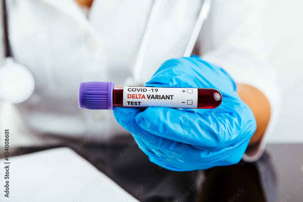 blood test in the hands of the doctor .blood test with the label Covid-19 DELTA Variant. blood test in the hands of the doctor .blood test with the label Covid-19 DELTA Variant.