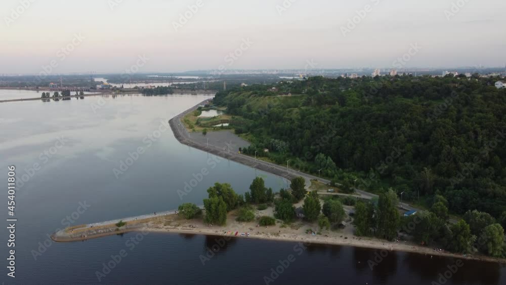 Drone view of a small beach in summer among a green neighbourhood of Vyshgorod Drone view of a small beach in summer among a green neighbourhood of Vyshgorod