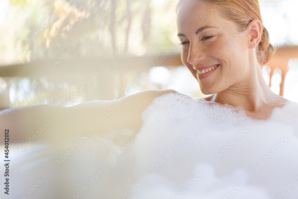 Woman relaxing in bubble bath Woman relaxing in bubble bath