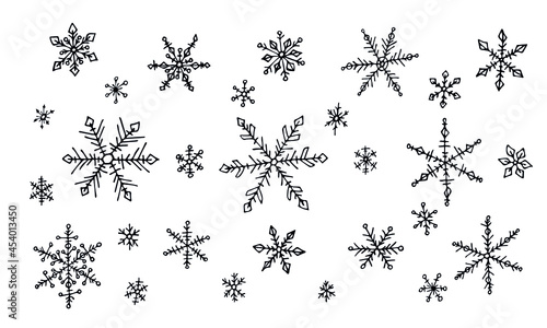 Cute hand drawn snowflakes set. Vector doodle isolated on white. Christmas and New Year modern design. For print  web  design  decoration  logo.