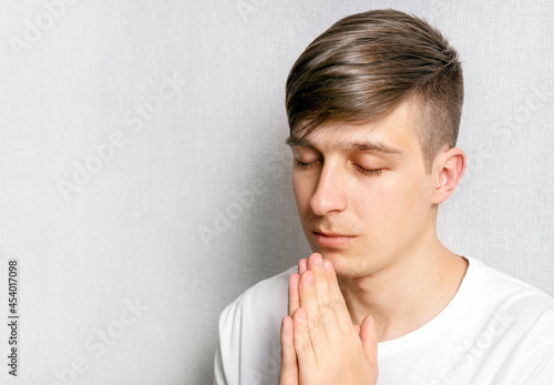 Young Man is praying