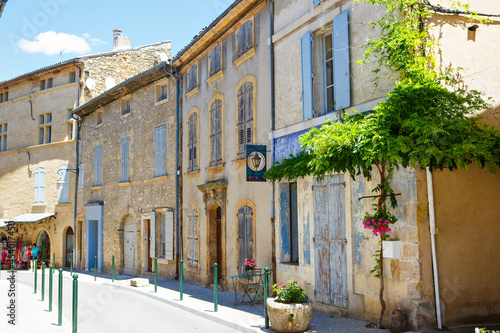 Provencal street with typical houses in southern France, Provence. Aix-en-Provence city on sunny summer day. photo