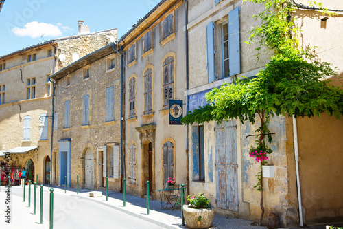 Fotografie Provencal street with typical houses in southern France, Provence