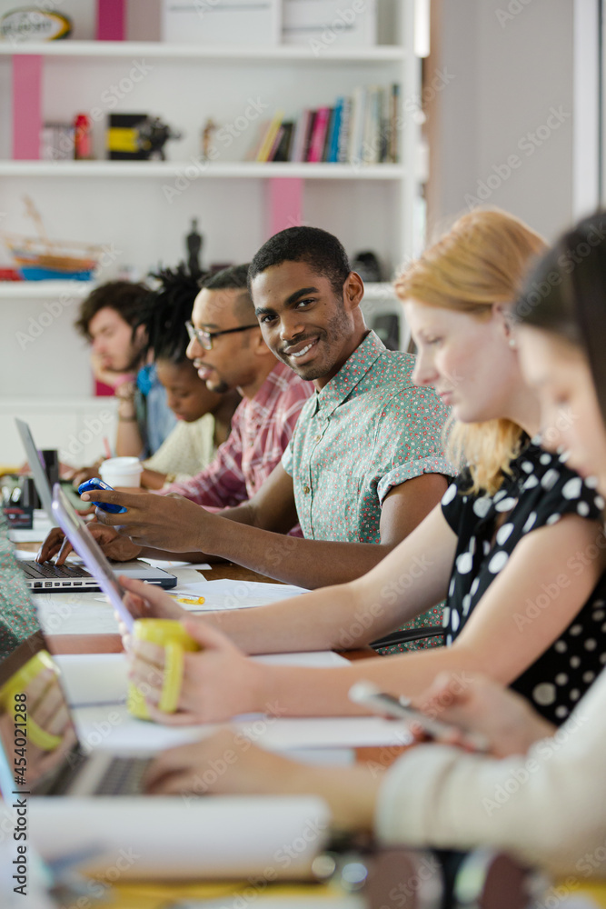 Fototapeta premium People working at conference table in office