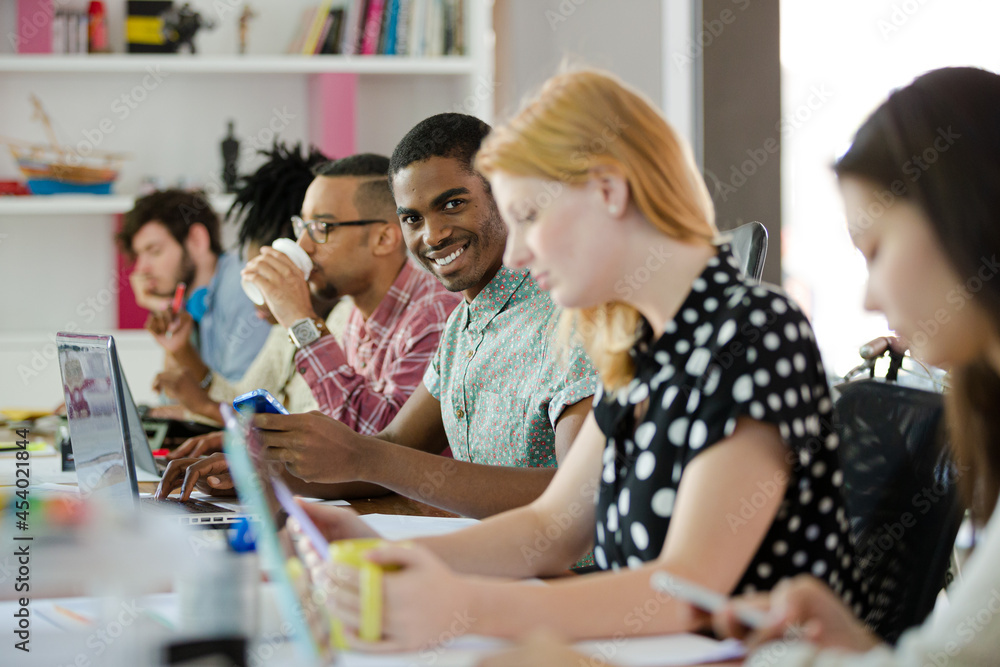 Fototapeta premium People working at conference table in office