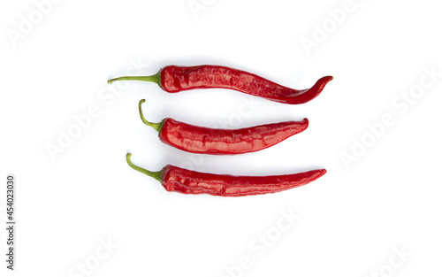 Red chili pepper on white background.