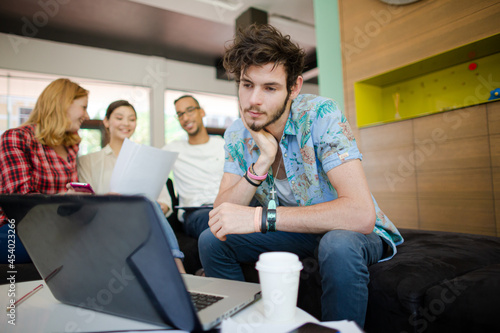 Man using laptop in office