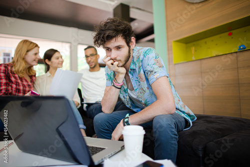 Man using laptop in office