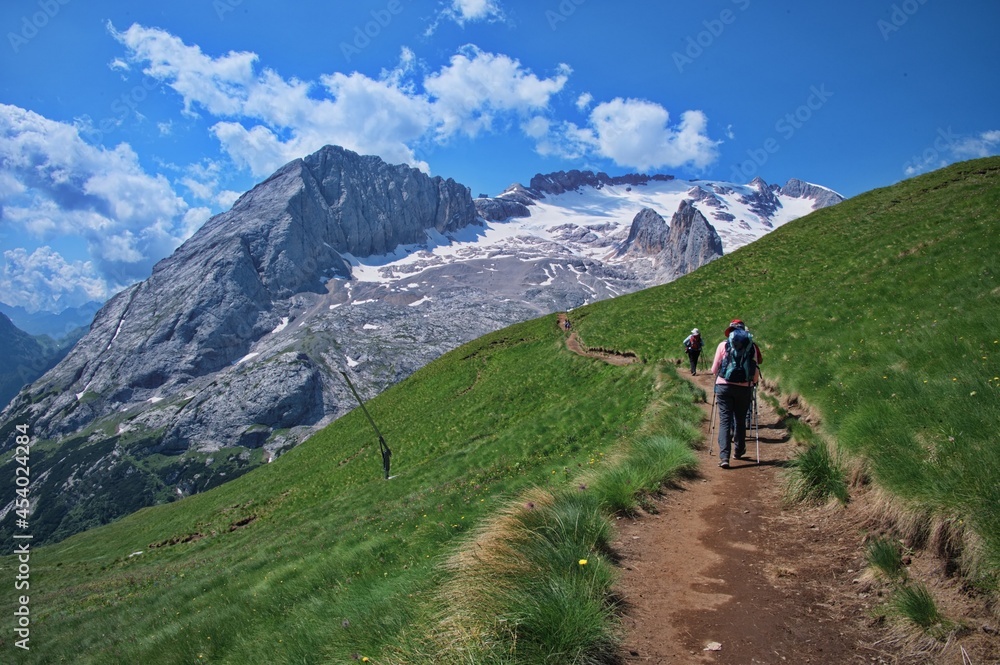 Hiking among amazing rocks of Dolomite mountains in Italy