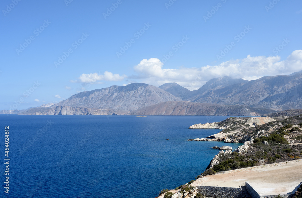 Sunny day landscape with sea and mountains near Chania, Crete 