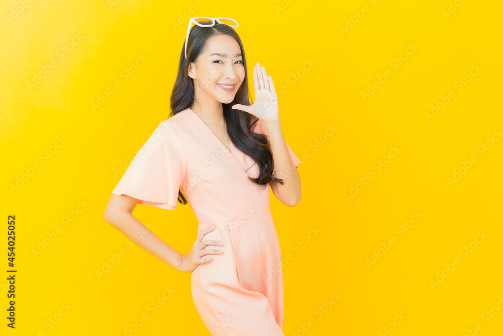 Portrait beautiful young asian woman smile with action Portrait beautiful young asian woman smile with action
